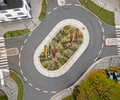 Ein visueller Entwurf zeigt die geplante Installation aus mehreren Stelen im begrünten Kreisverkehr am Lamperfeld in Bottrop.